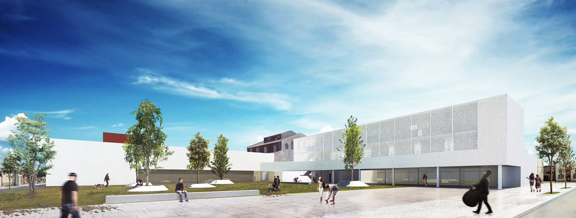 Centro cultural moderno y en un entorno amplio y verde.